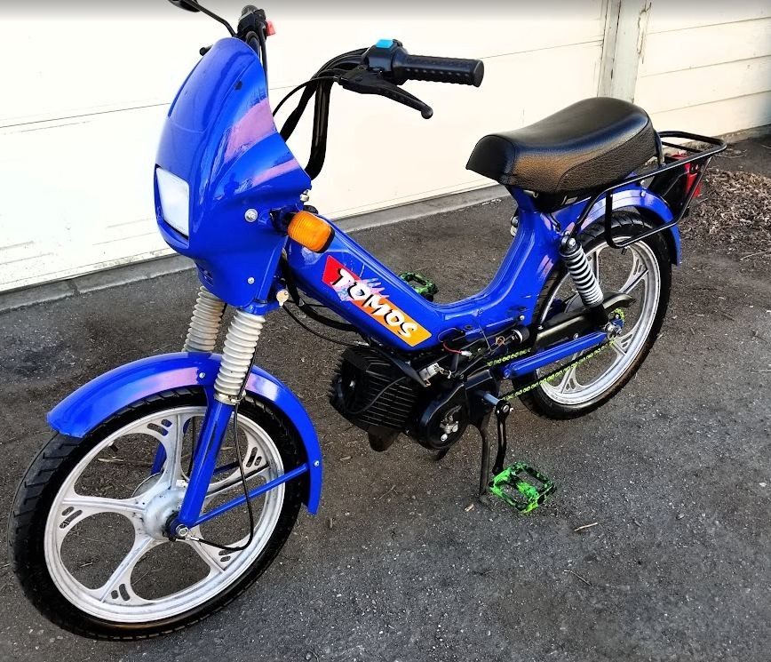 A blue Tomos in the Moped Motel fleet